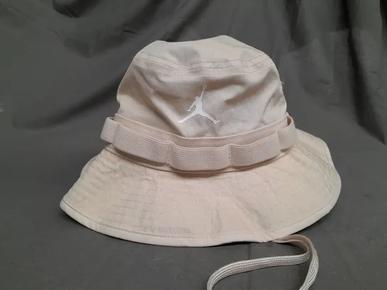 JORDAN DRAW STRING BUCKET HAT IN CREAM