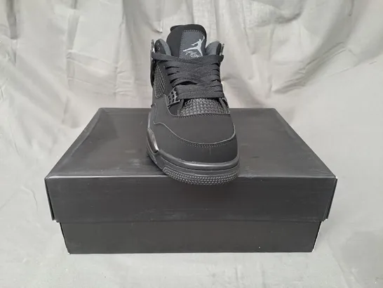 BOXED PAIR OF NIKE AIR JORDAN 4 RETRO SHOES IN BLACK UK SIZE 9.5