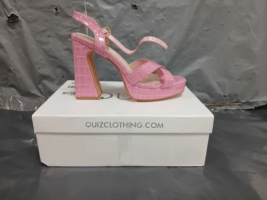 QUIZ PINK CROCODILE CROSS STRAP PLATFORM HEELED SANDAL