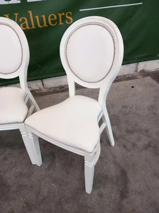 FOUR DESIGNER WHITE ISLA STYLE BANQUET CHAIRS