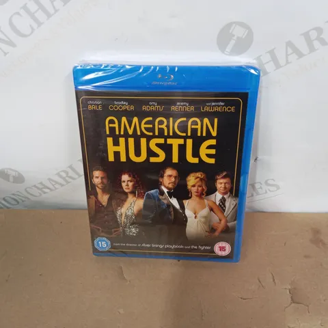 LOT OF APPROXIMATELY 20 SEALED AMERICAN HUSTEL BLU-RAY DISCS