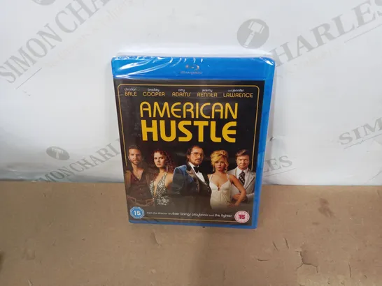 LOT OF APPROXIMATELY 20 SEALED AMERICAN HUSTEL BLU-RAY DISCS