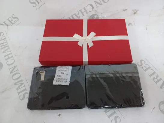 BOX OF TWO BELL AND HOWELL RFID WALLETS IN BLACK