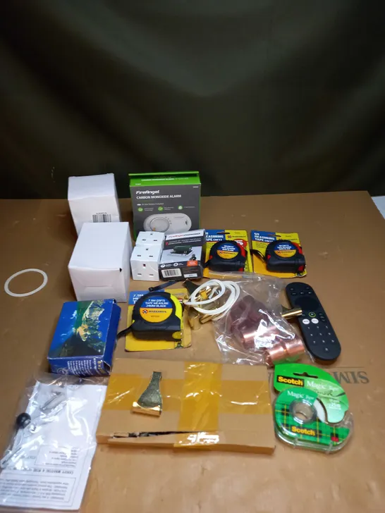 LOT OF ASSORTED ITEMS TO INCLUDE TAPE MEASURES, REMOTE CONTROLS AND LOOSE FITTINGS