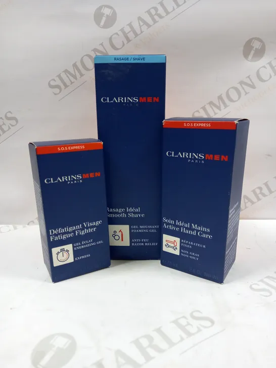 CLARINS PARIS MENS BUNDLE INCLUDING ACTIVE HAND CARE, SMOOTH SHAVE FOAMING GEL, FATIGUE FIGHTER ENERGIZING GEL