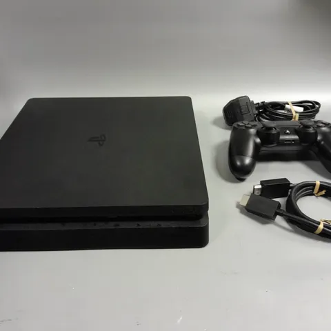 UNBOXED BLACK PS4 WITH CONTROLLER AND WIRES 
