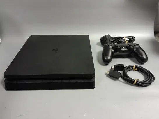 UNBOXED BLACK PS4 WITH CONTROLLER AND WIRES 