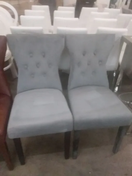 PAIR OF DESIGNER GREY VELVET BUTTON BACK DINING CHAIRS WITH BLACK LEGS