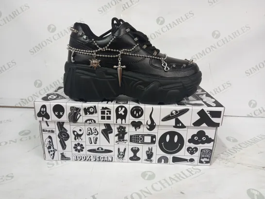 BOXED PAIR OF KOI PLATFORM TRAINERS IN BLACK W. SILVER EFFECT CHAINS & CHARMS SIZE 4