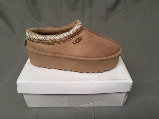 BOXED PAIR OF UGG SLIP ON SHOES IN LIGHT BROWN SIZE EU 36