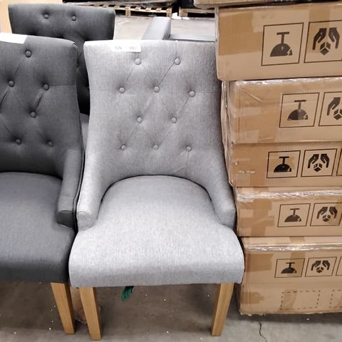 DESIGNER GREY FABRIC CHAIR WITH BUTTONED BACK AND SMALL ARM RESTS ON WOODEN LEGS
