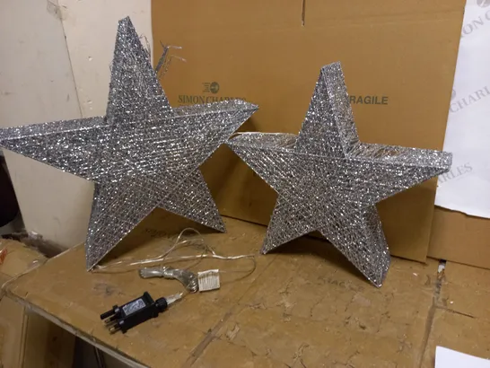 HR PRE LIT SET OF 2 OVERSIZED GLITTER STARS 