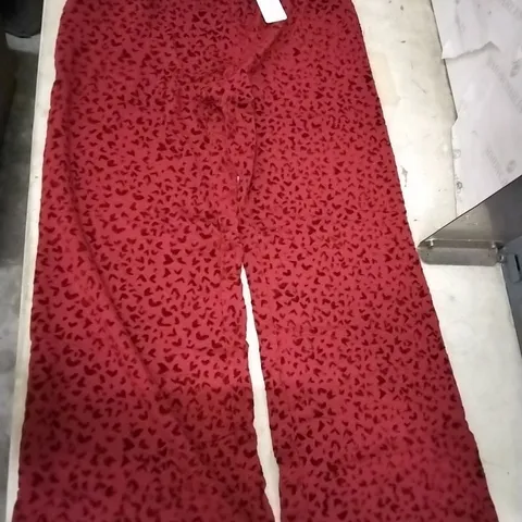 BOX OF APPROXIMATELY 20 DANNII MINOGUE RED HEART FLOCKED WIDE LEG TROUSERS PETITE - SIZE 14