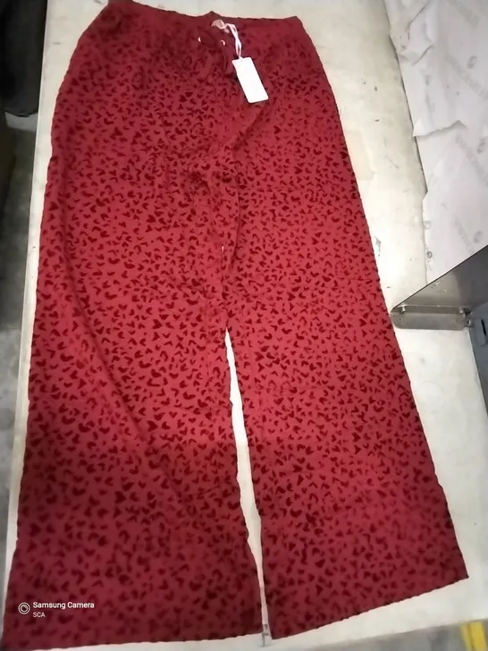 BOX OF APPROXIMATELY 8 DANNII MINOGUE RED HEART FLOCKED WIDE LEG TROUSERS PETITE - SIZE 14