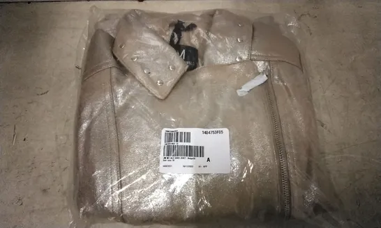 BOX OF APPROX 13 JULIEN MACDONALD BEIGE/SILVER BIKER JACKET - SIZE 10