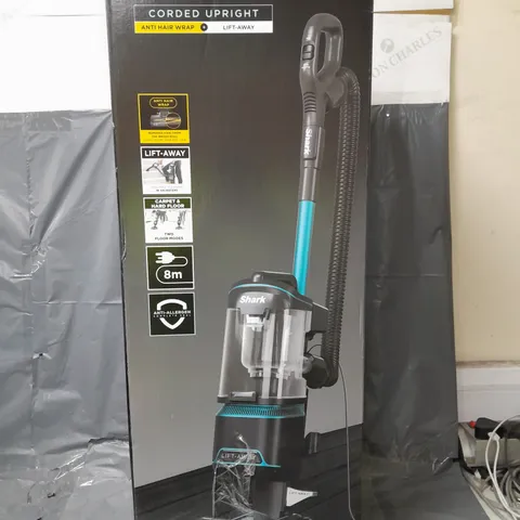 BOXED SHARK UPRIGHT CORDED VACUUM WITH ANTI-HAIR WRAP, LIFTAWAY TECHNOLOGY AND COMPLETE SEAL NZ690UK