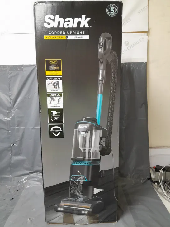 BOXED SHARK UPRIGHT CORDED VACUUM WITH ANTI-HAIR WRAP, LIFTAWAY TECHNOLOGY AND COMPLETE SEAL NZ690UK RRP £249