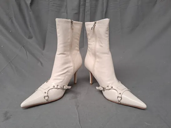 BOXED PAIR OF EGO KELSET POINTED TOE HEELED BOOTS IN BEIGE UK SIZE 6