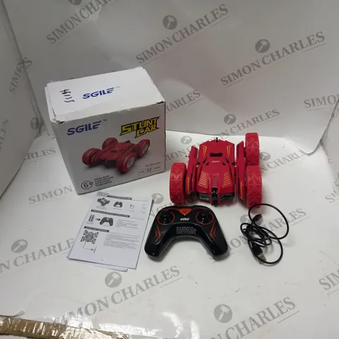 BOXED SGILE RADIO CONTROL STUNT CAR IN RED, WITH TRANSMITTER, USB CABLE AND INSTRUCTIONS