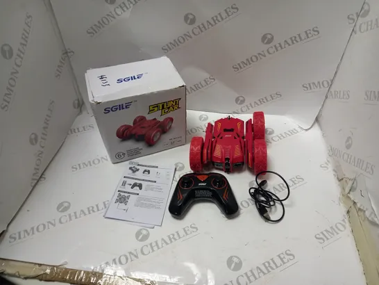 BOXED SGILE RADIO CONTROL STUNT CAR IN RED, WITH TRANSMITTER, USB CABLE AND INSTRUCTIONS