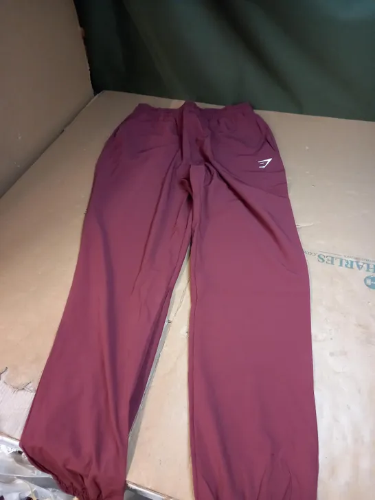 BURGANDY GYMSHARK TRACK PANTS SIZE M 