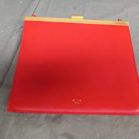 CELINE PARIS IN ORANGE CLUTCH BAG