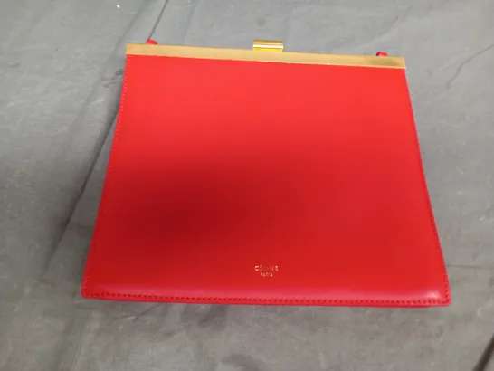 CELINE PARIS IN ORANGE CLUTCH BAG