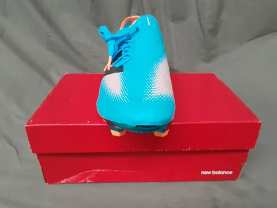 BOXED PAIR OF NEW BALANCE FURON FOOTBALL BOOTS IN SKY BLUE/ORANGE UK SIZE 10.5