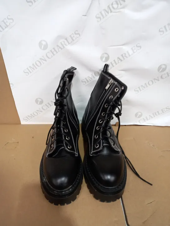 BOXED PAIR OF FAUX LEATHER ZIP AND LACE UP BOOTS SIZE 6