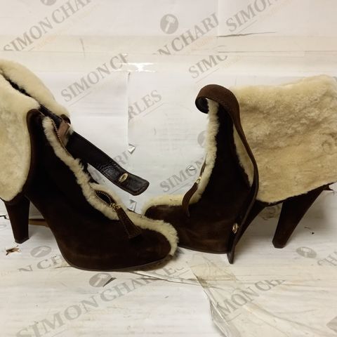 BOXED PAIR OF BROWN/WHITE FURRY HIGH HEEL BOOTS