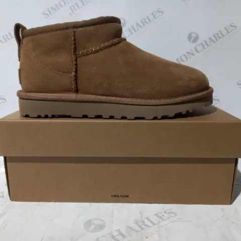 BOXED PAIR OF UGG CLASSIC ULTRA MINI SHOES IN TAN UK SIZE 4
