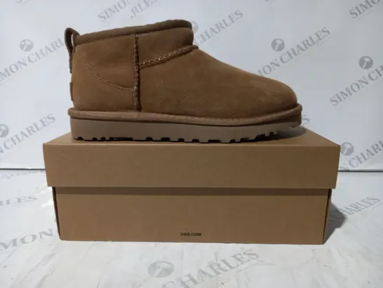 BOXED PAIR OF UGG CLASSIC ULTRA MINI SHOES IN TAN UK SIZE 4