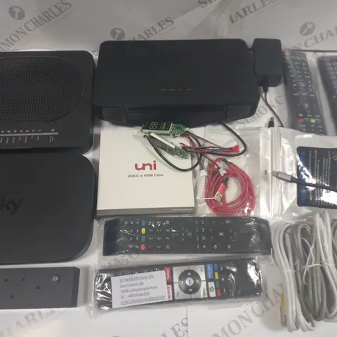 CRATE OF ASSORTED TECH ITEMS TO INCLUDE VARIOUS REMOTES, ROUTERS AND LOGI M220 