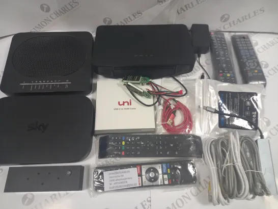 CRATE OF ASSORTED TECH ITEMS TO INCLUDE VARIOUS REMOTES, ROUTERS AND LOGI M220 