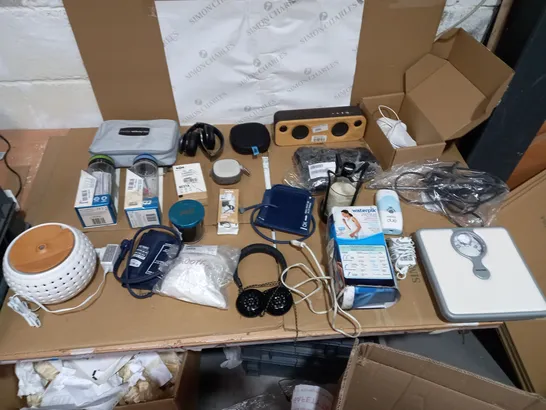 LOT OF APPROXIMATLY 15 ITEMS TO INCLUDE JAM WIRELESS HEADPHONES, MARLEY GET TOGETHER MINI, AND HOMEDICS SUO PLUS ETC.