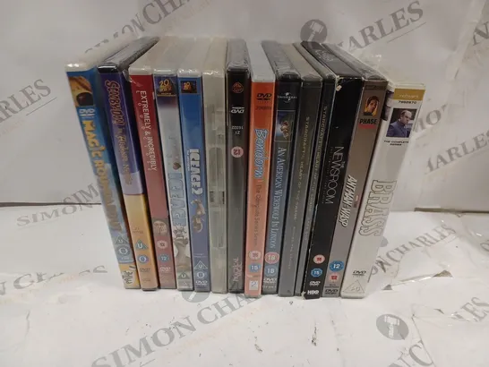 BOX OF APPROXIMATELY 15 ASSORTED DVDS TO INCLUDE THE COMPLETE FAULTY TOWERS, CASINO ROYALE, WHERE THE WILD THINGS ARE, ETC