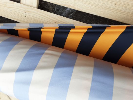 ROLL OF STRIPED ORANGE/BLACK POLYESTER FOOTBALL SHIRT FABRIC- SIZE UNSPECIFIED 