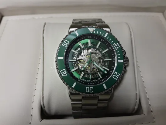 BOXED DESCHAMPS & CO AUTOMATIC GREEN SKELETON DIAL WATCH