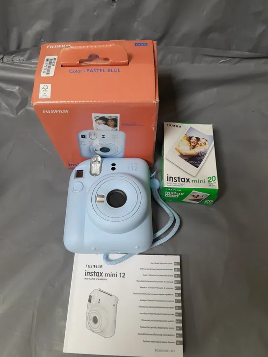 BOXED FUJIFILM INSTAX MINI 12 INSTANT CAMERA PALE BLUE RRP £94.99