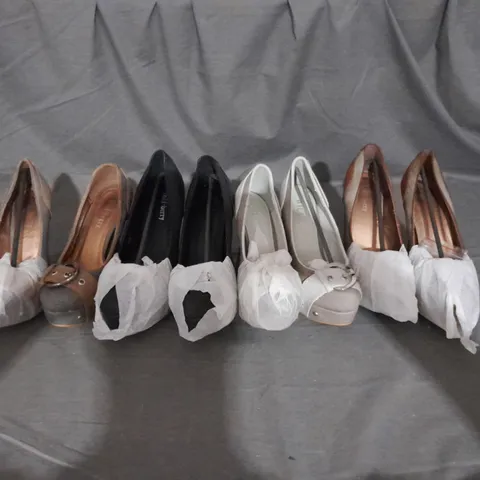 APPROXIMATELY 10 BOXED PAIR OF HEELED PLATFORM SHOES IN VARIOUS COLOURS AND SIZES 