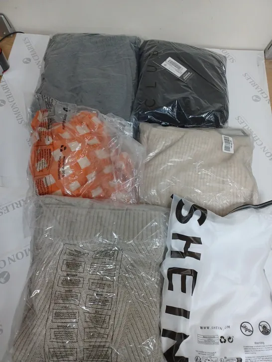 LARGE BOX OF ASSORTED CLOTHING ITEMS IN VARIOUS COLOURS AND SIZES INCLUDING TROUSERS , TOPS AND JUMPERS 