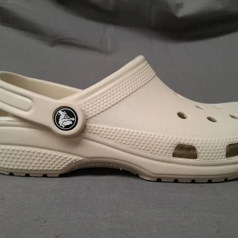 PAIR OF CROCS CLASSIC CLOGS IN BEIGE UK SIZE M5/W6