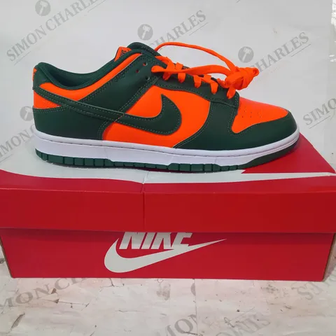 BOXED PAIR OF NIKE DUNK LOW RETRO TRAINERS IN FOREST GREEN/ORANGE UK SIZE 10