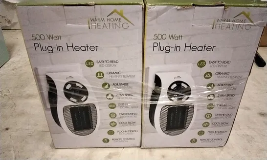 LOT OF 2 WARM HOME CERAMIC PLUG IN HEATERS