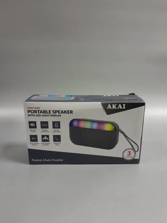 BOXED SEALED AKAI PORTABLE WIRELESS SPEAKER WITH LED LIGHT DISPLAY 