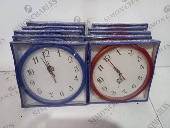 BOX OF APPROX 10 SMALL BLUE AND RED QUARTZ CLOCKS