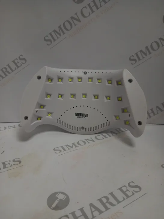 BOXED PROFESSIONAL GEL POLISH UV LED NAIL DRYER LAMP.