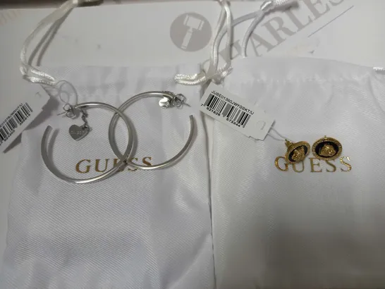 BOX OF 2 GUESS ITEMS TO INCLUDE HEART TO HEART LADIES HOOP EARRINGS AND DAKTARI LION SUD EARRINGS RRP £98