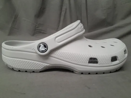 PAIR OF CROCS CLASSICS IN GREY UK SIZE M5/W6