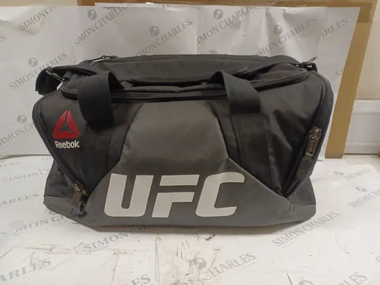 LARGE REEBOK UFC COMBAT GRIP TRAINING DUFFEL BAG WITH REEBOK UFC ZIP-UP JACKET (MEDIUM) AND SANDALS